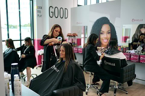 Amanda Golini gets her hair styled